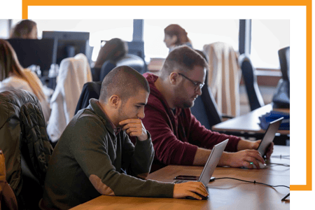 Alter Solutions consultants working at the office
