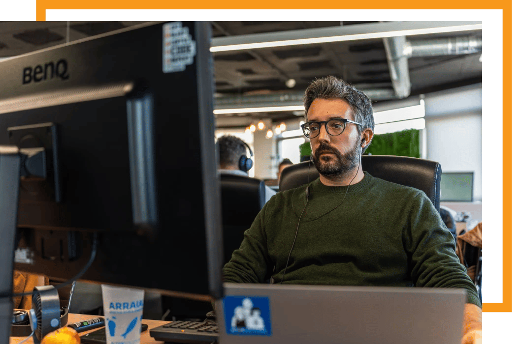 Alter Solutions pentester working at the office