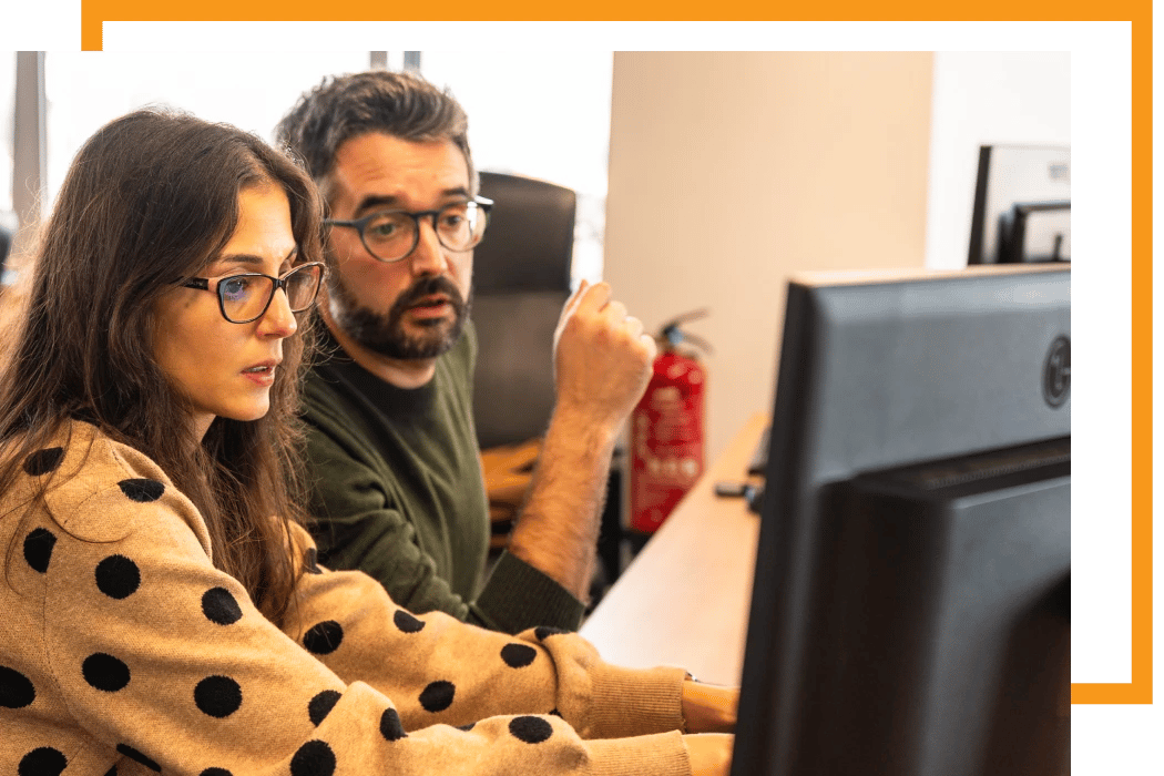 Colleagues working together at the Alter Solutions office