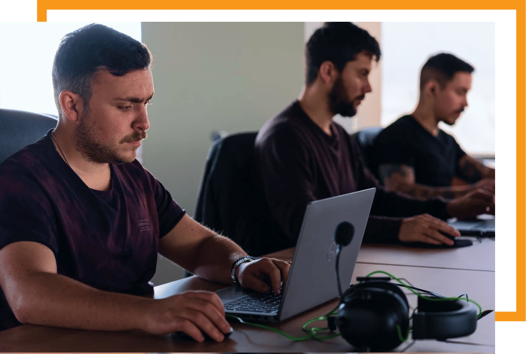 Team of Agile Masters working at a client's office