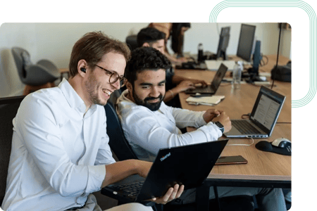 Project Manager and Developer discussing the testing strategy