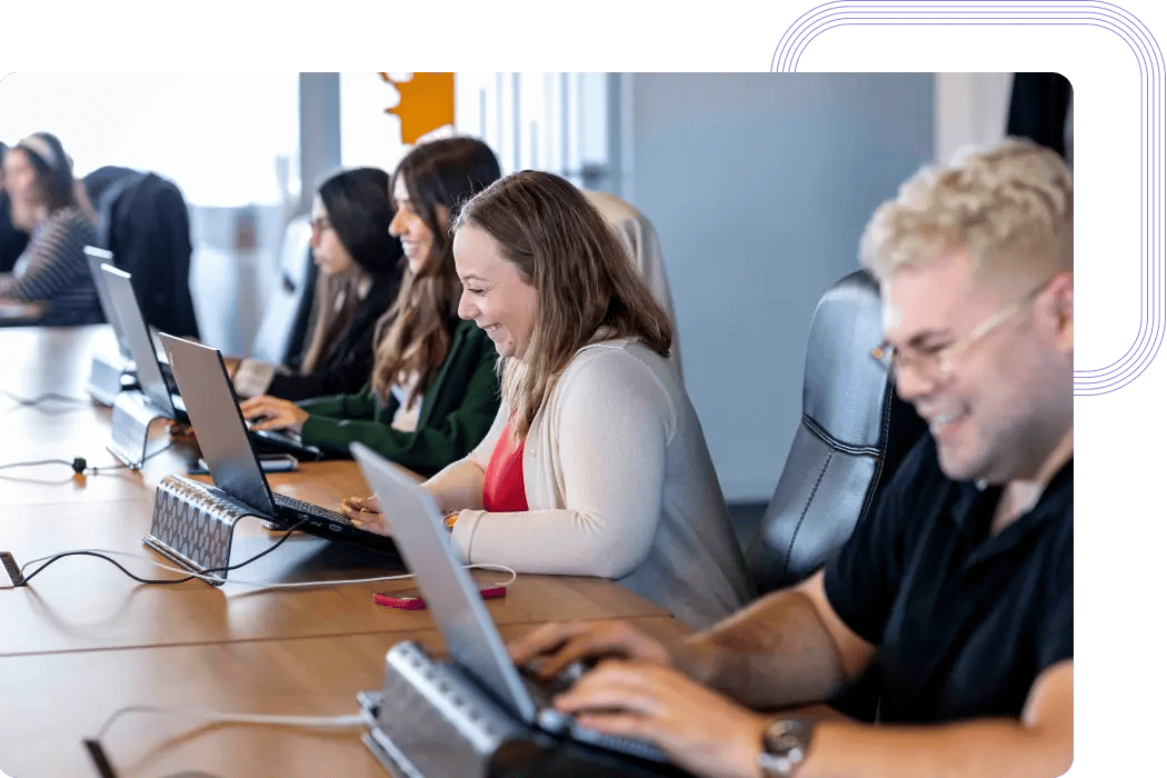 Outsourcing team of software developers on a team meeting