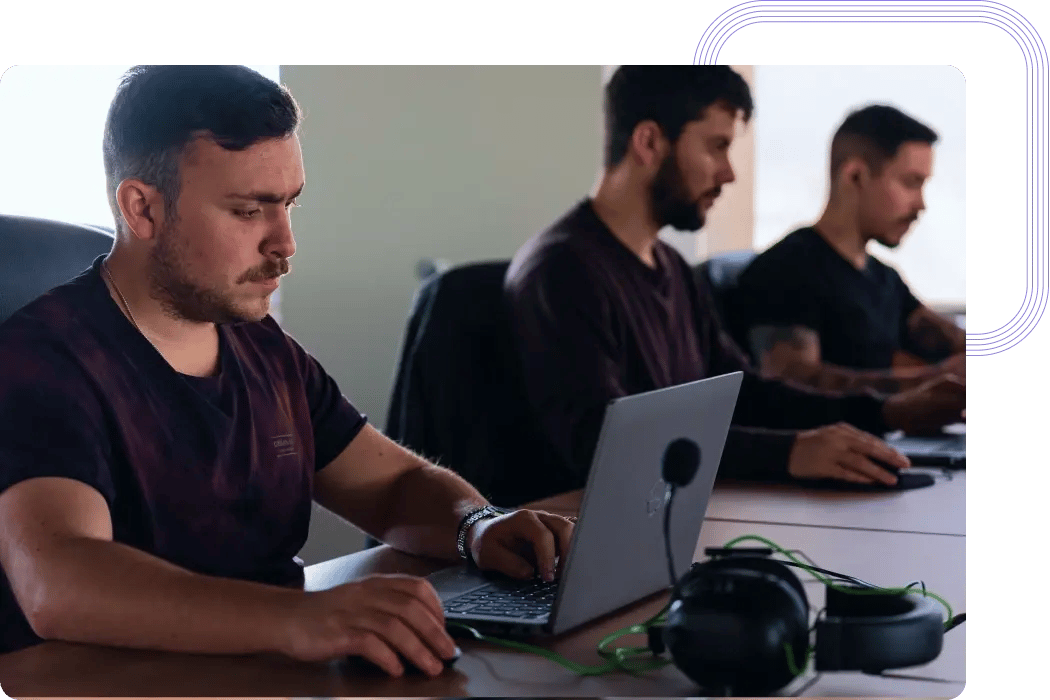 Team of Agile Masters working at a client's office