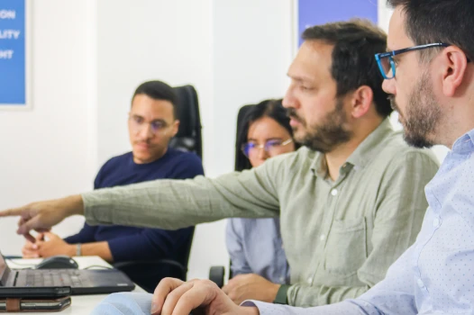 Alter Solutions consultants working together Alter Solutions consultants working together